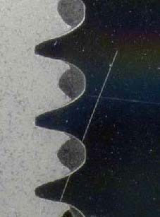 Metallographic cut of the play-free engagement between male and formed female thread